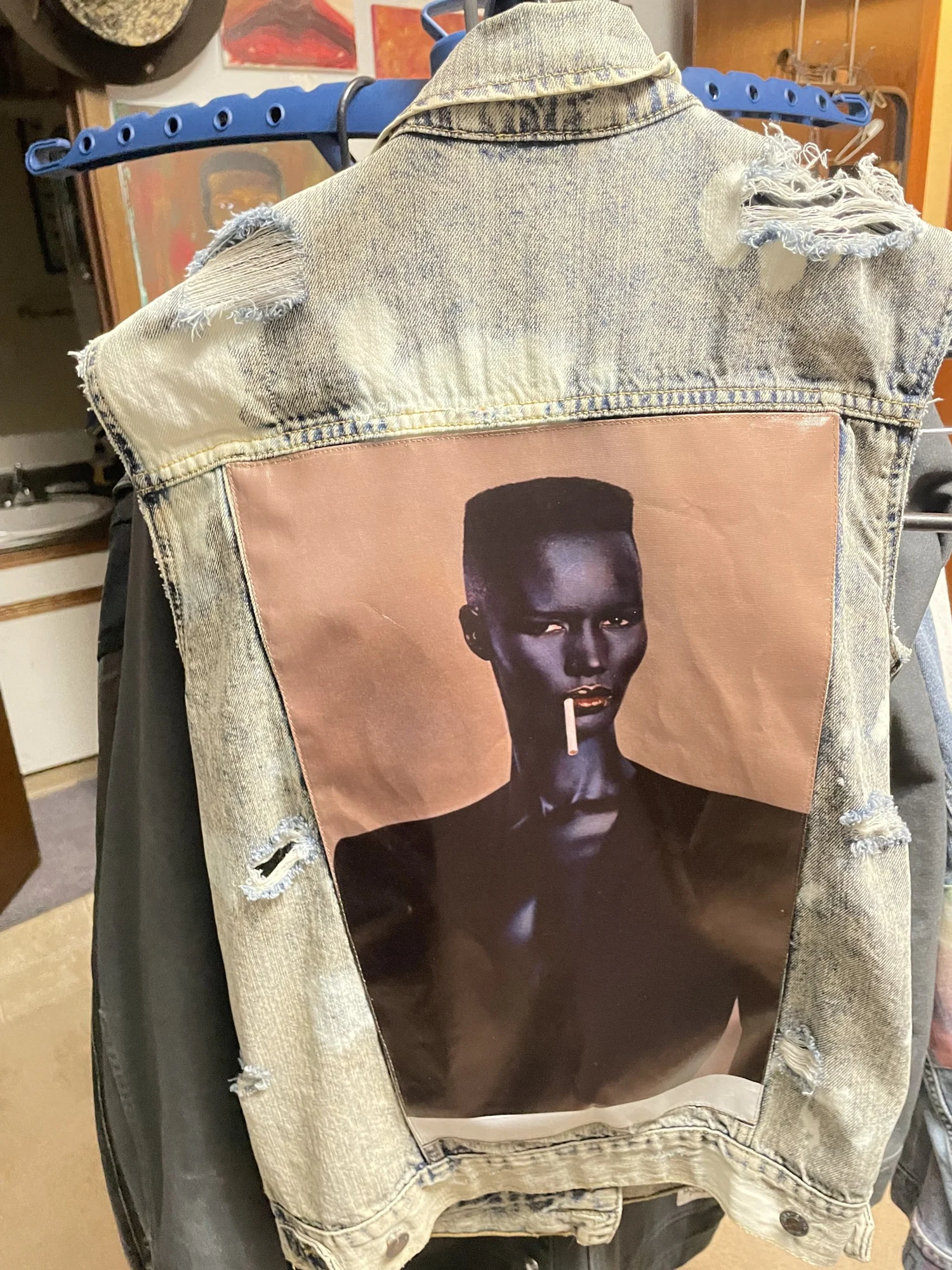 Distressed portrait vest / back